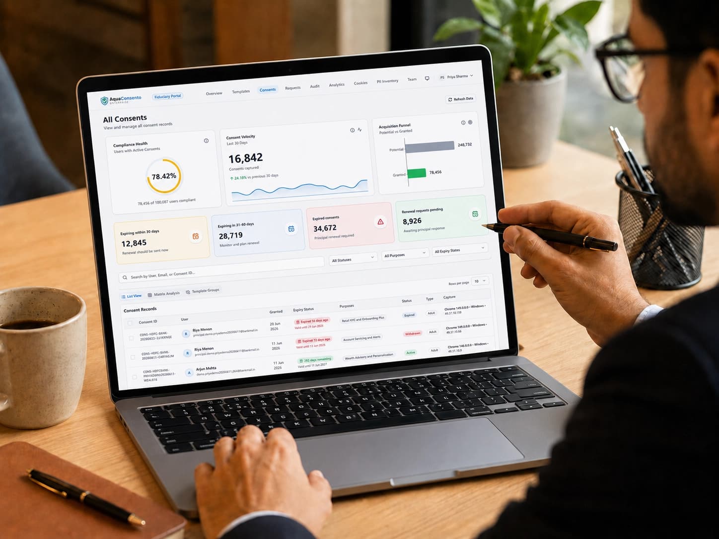 AquaConsento audit and compliance workspace shown on a laptop
