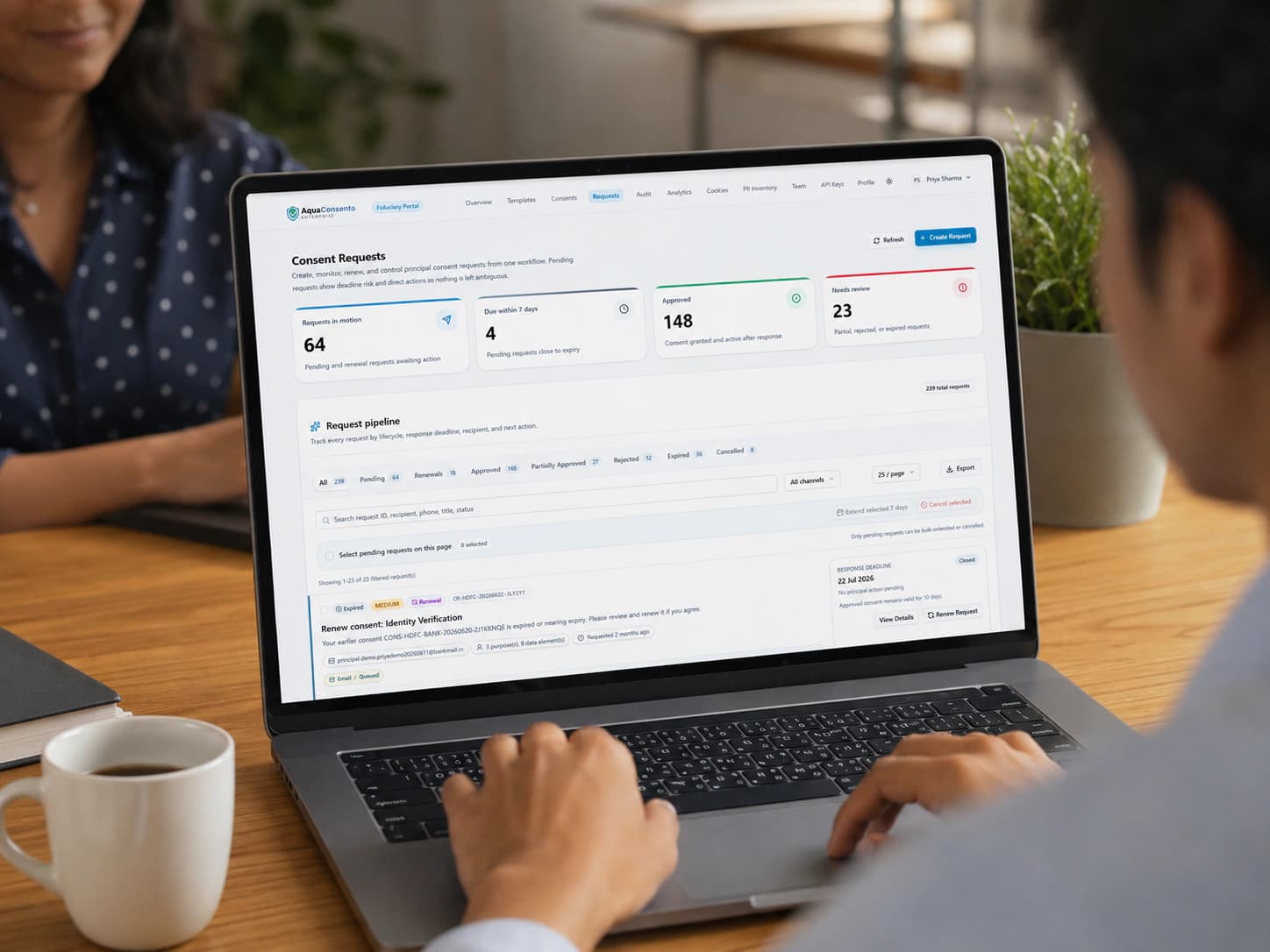 AquaConsento audit and compliance workspace shown on a laptop